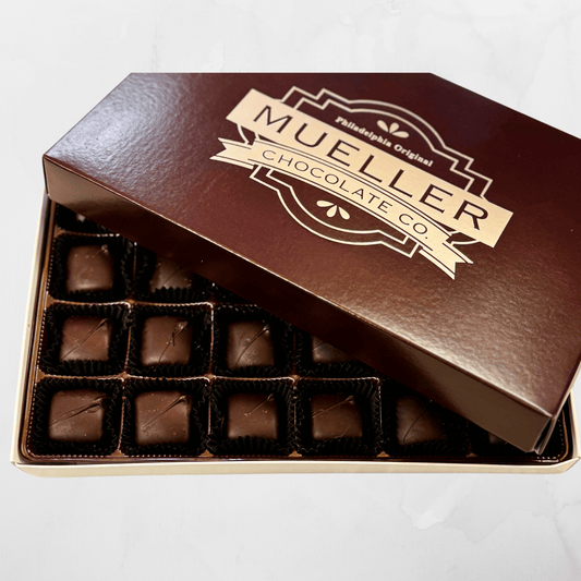 24-piece box of dark chocolate-covered caramels, smooth and creamy inside with a decadent chocolate coating.