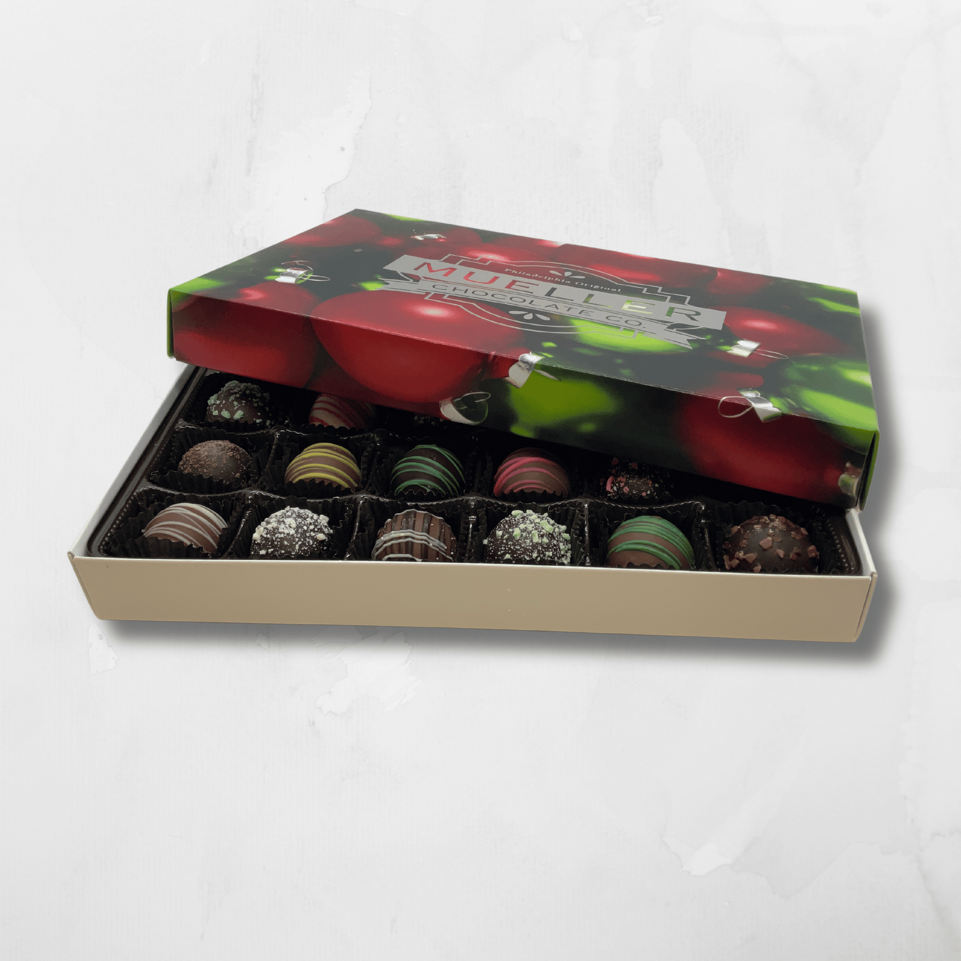 Holiday Chocolate Truffle Box with milk, dark, and white chocolate shells and dark chocolate ganache filling.