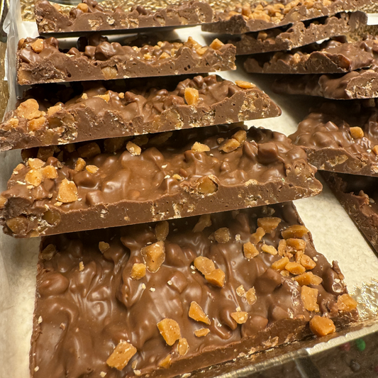 Handmade Milk Chocolate Toffee Bark with rich milk chocolate and crunchy toffee bits. Perfect for gifting or personal indulgence.