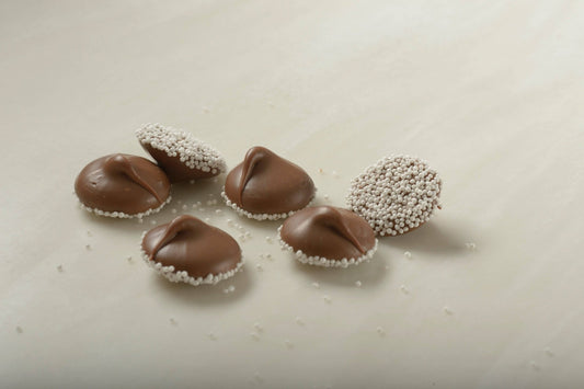 Milk Chocolate Nonpareils with White Seeds - Handmade Chocolate | Mueller Chocolate Co.