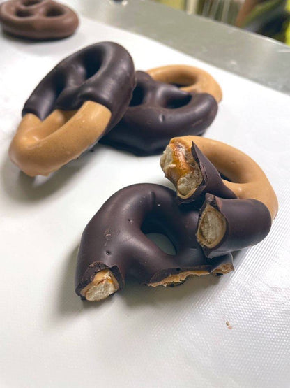 Peanut Butter Dark Chocolate Half-Dipped Pretzels - Mueller Chocolate Co