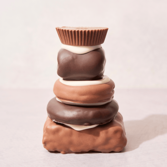 Mueller’s Chocolate Tower, a gourmet stack of chocolate-covered treats, featured on the Food Network. A must-try for chocolate lovers.