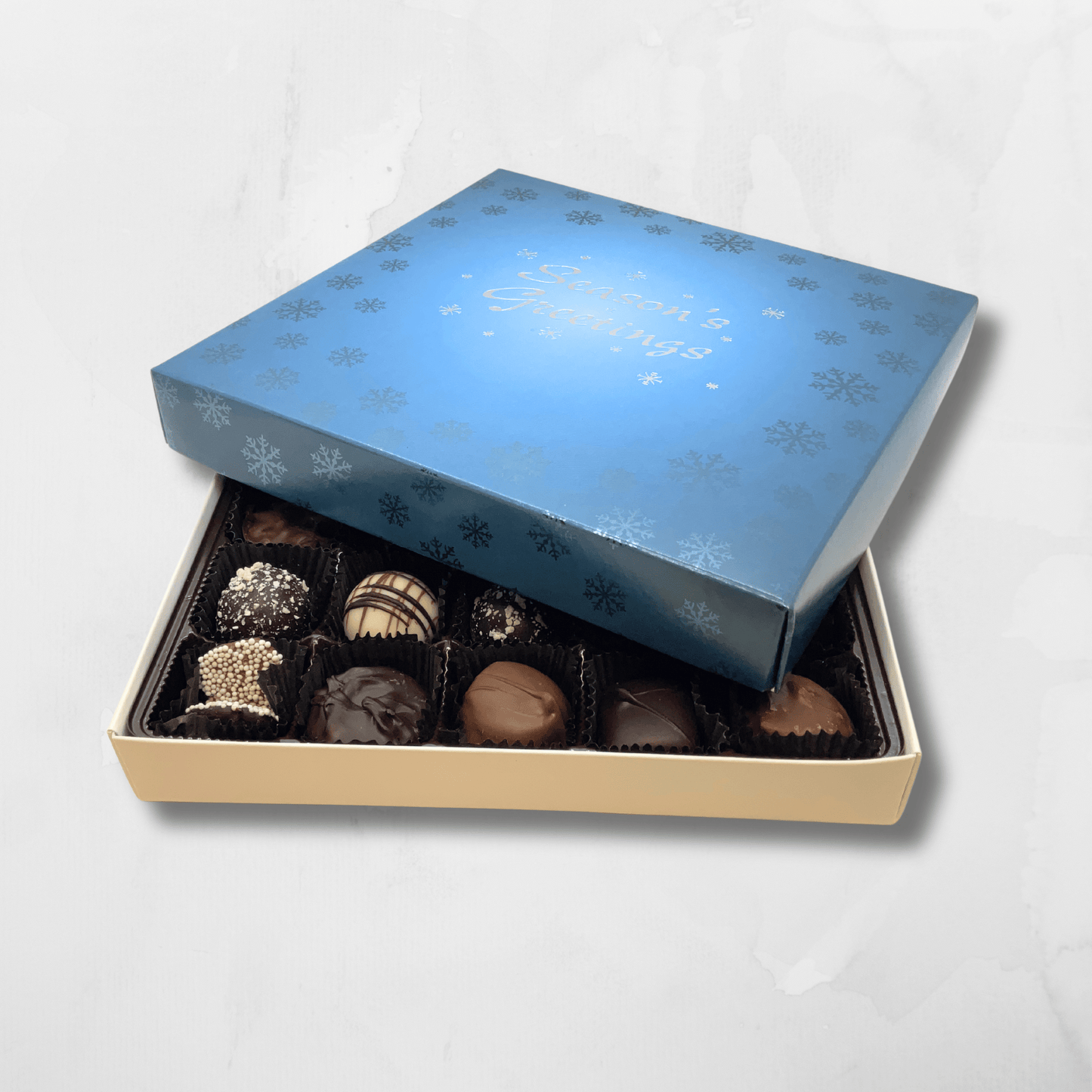 Season's Greetings milk and dark chocolate assortment in festive holiday gift box