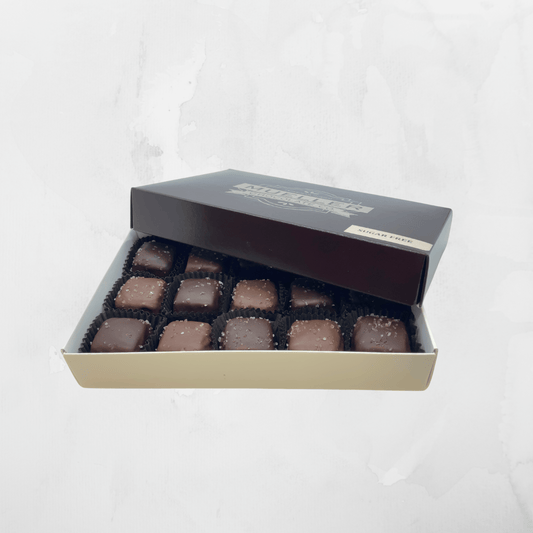 15-piece box of Sugar-Free Milk and Dark Chocolate Sea Salt Caramels, a sweet and savory sugar-free treat.