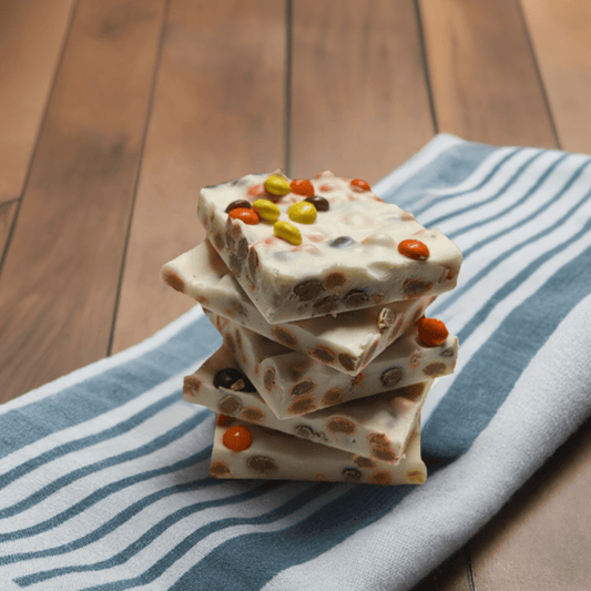 White Chocolate Reese Pieces Bark - Handmade | Mueller Chocolate Co.